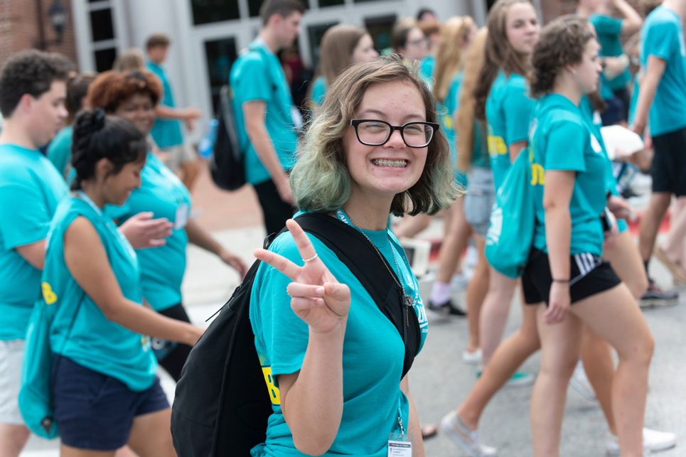 Freshman walking to convocation