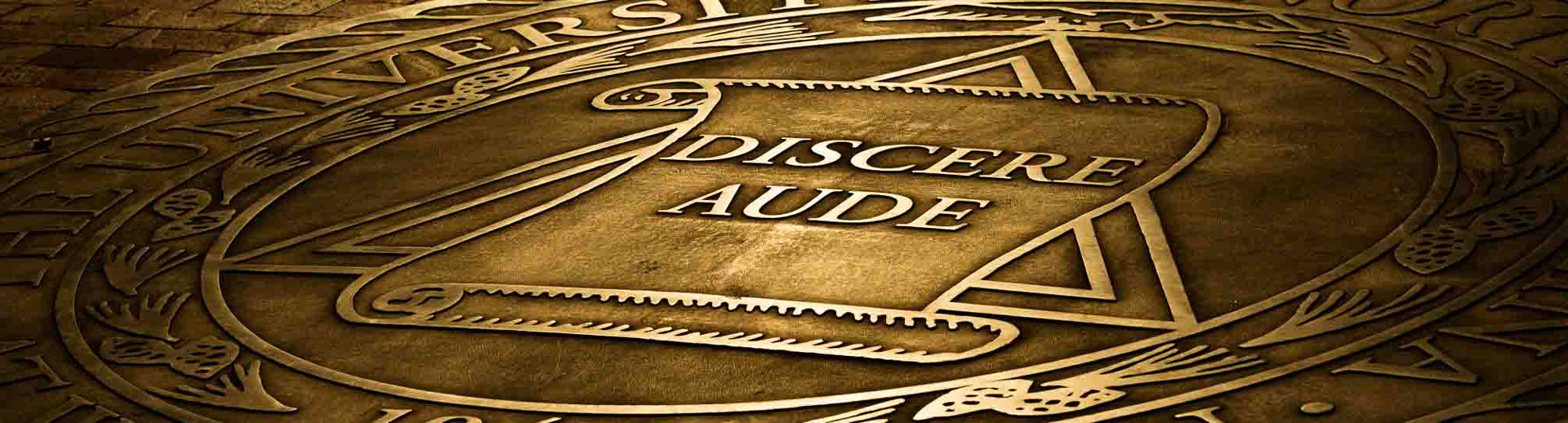 university seal: Discere Aude