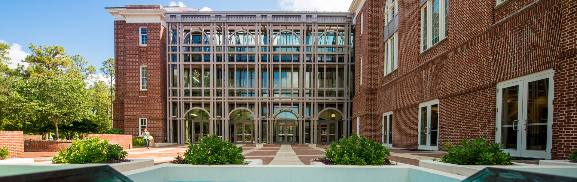 Exterior of Watson school of education’s building and brick courtyard