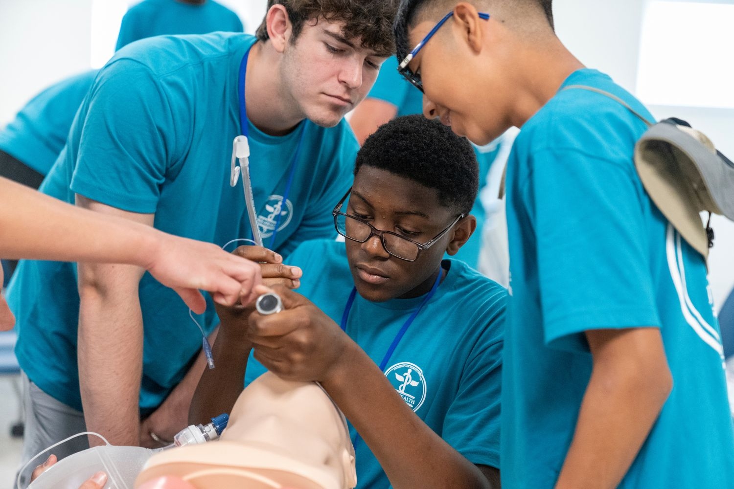 Students operating on a dummy