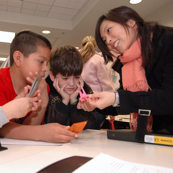 Teacher demonstrates craft