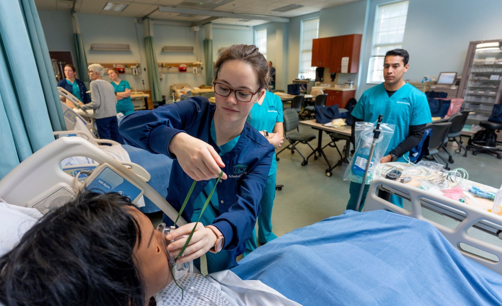 Nursing student working on a dummy
