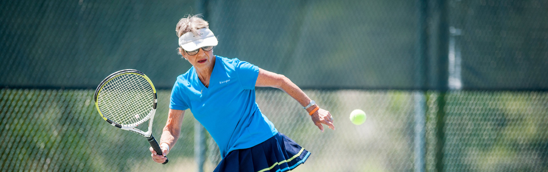 Person playing tennis