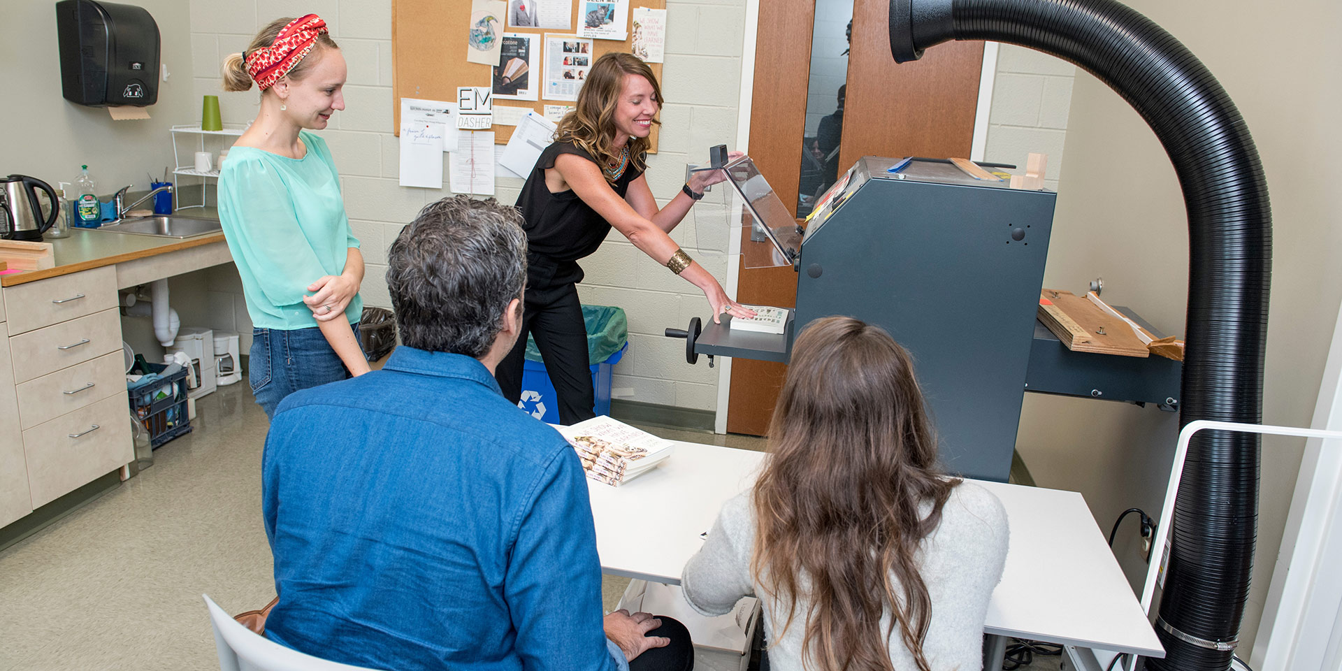A group of people using the Publishing Lab