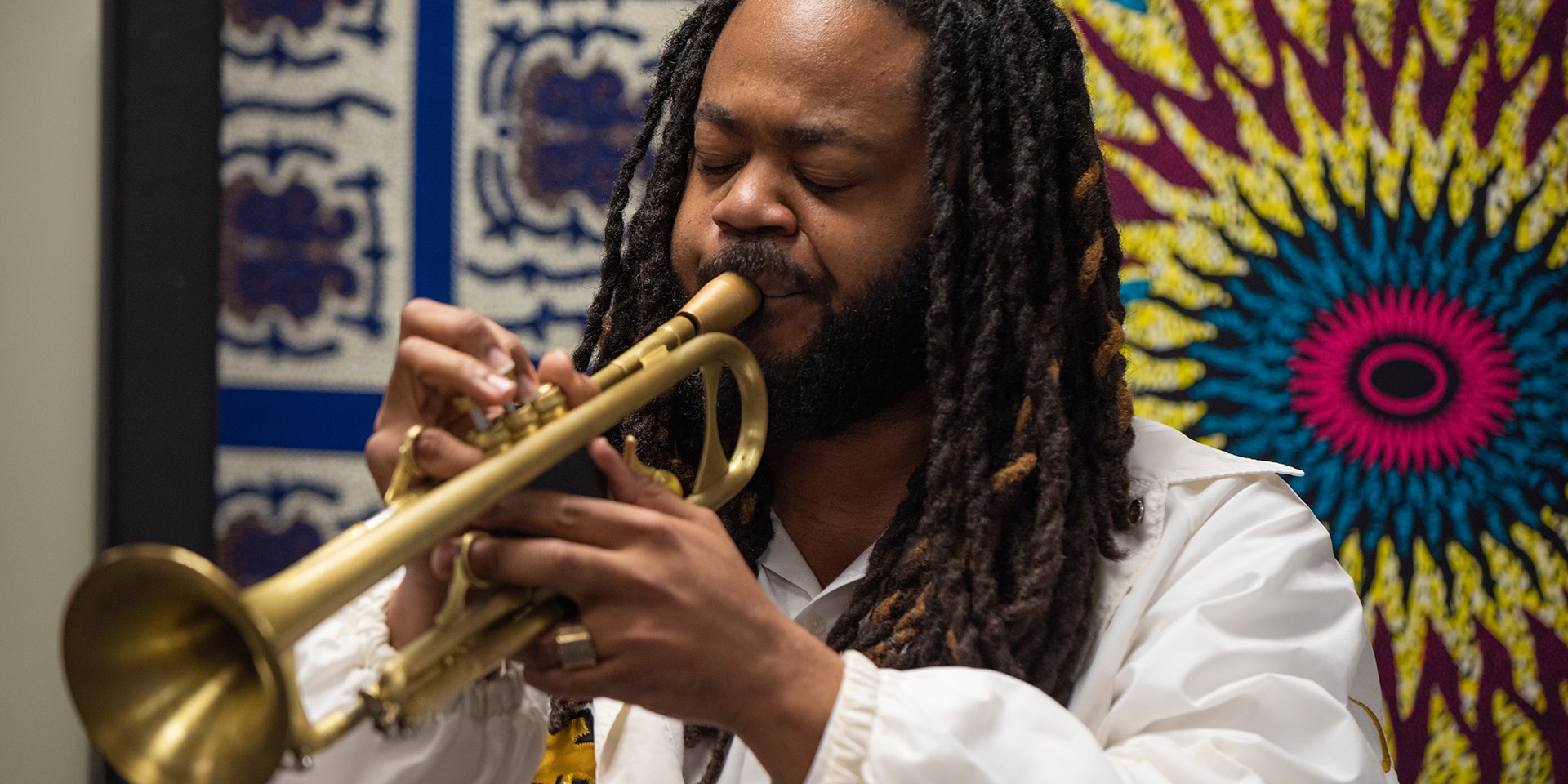 A performer plays the trumpet during Upperman’s 25th anniversary ceremony