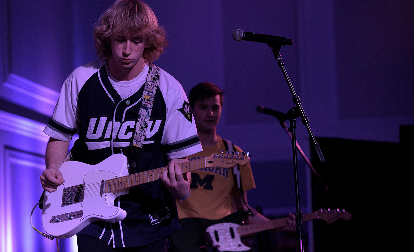 A guitar player shows off his skills