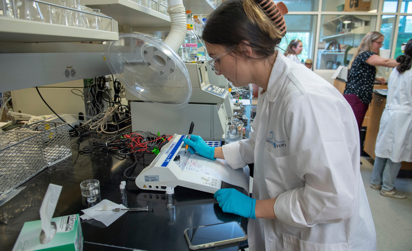 Three women working in a laboratory