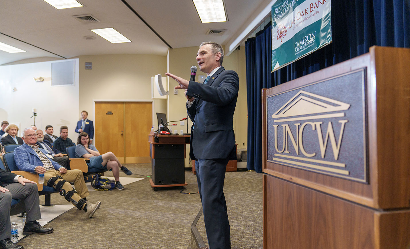 speaker talking with audience