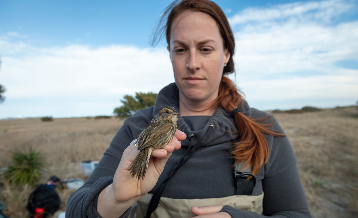 Girl holding bird