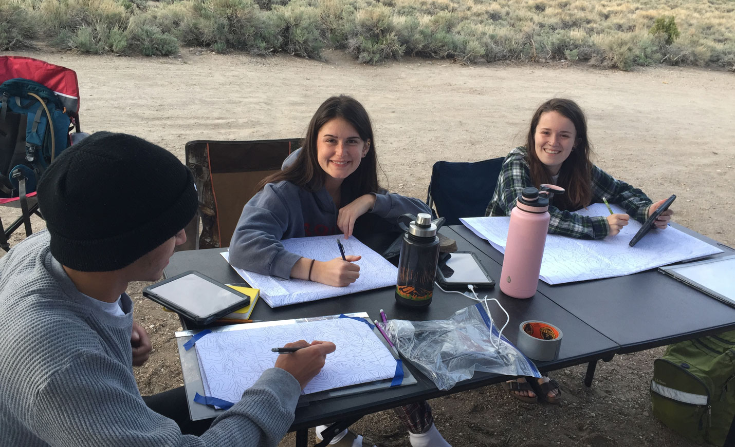 Student studying maps