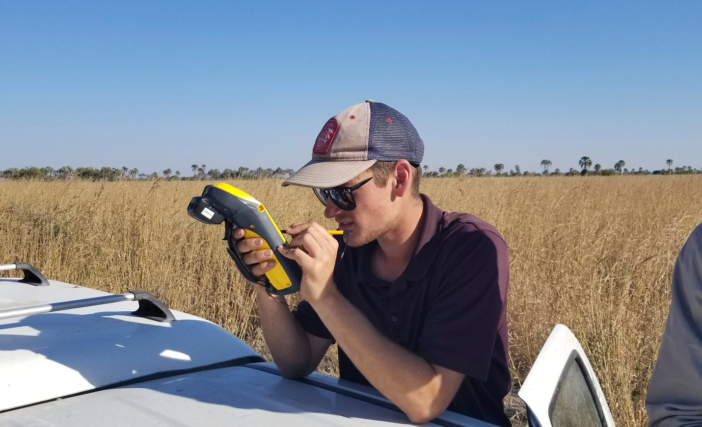 Student using geology meter