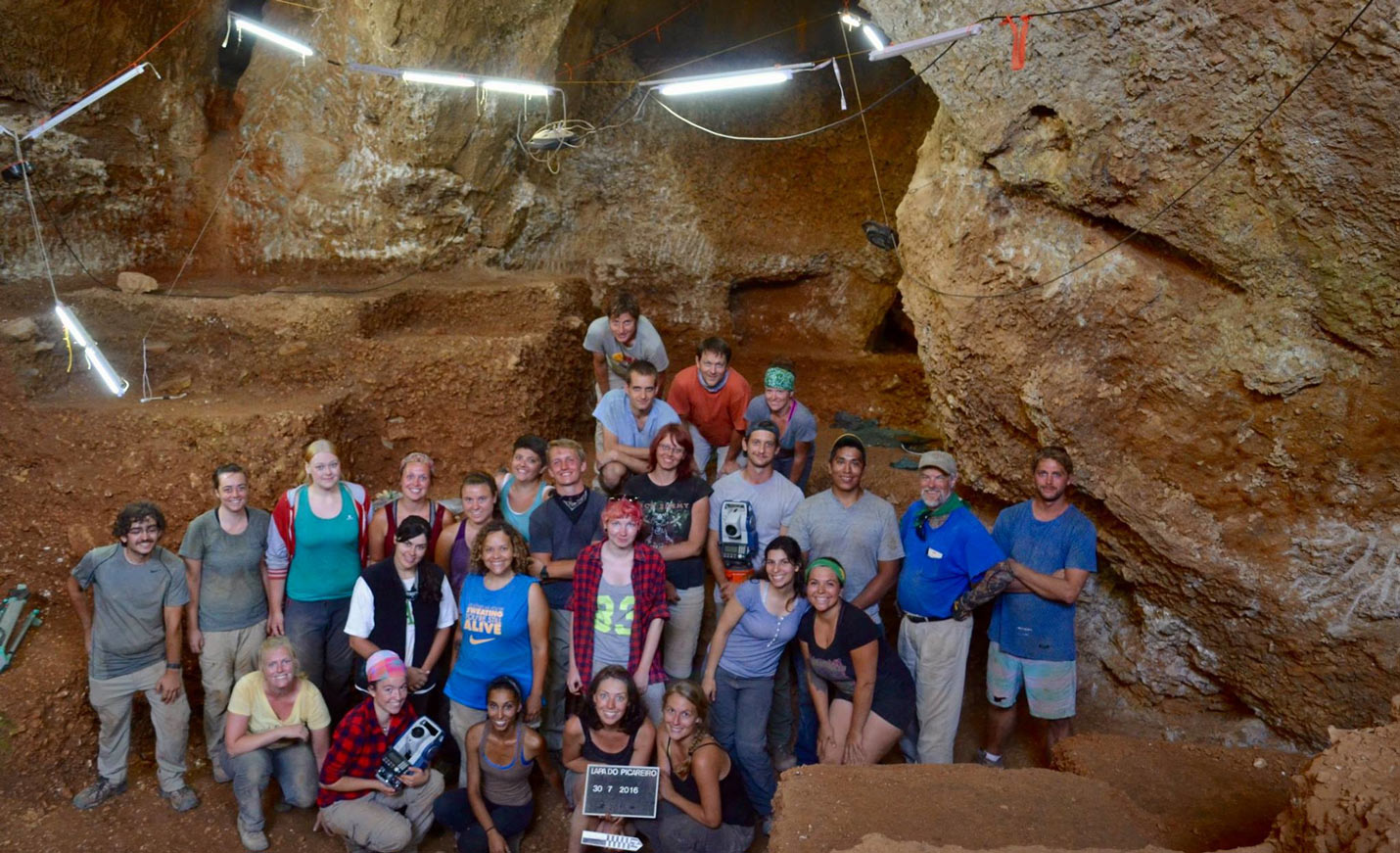 Students in a cave