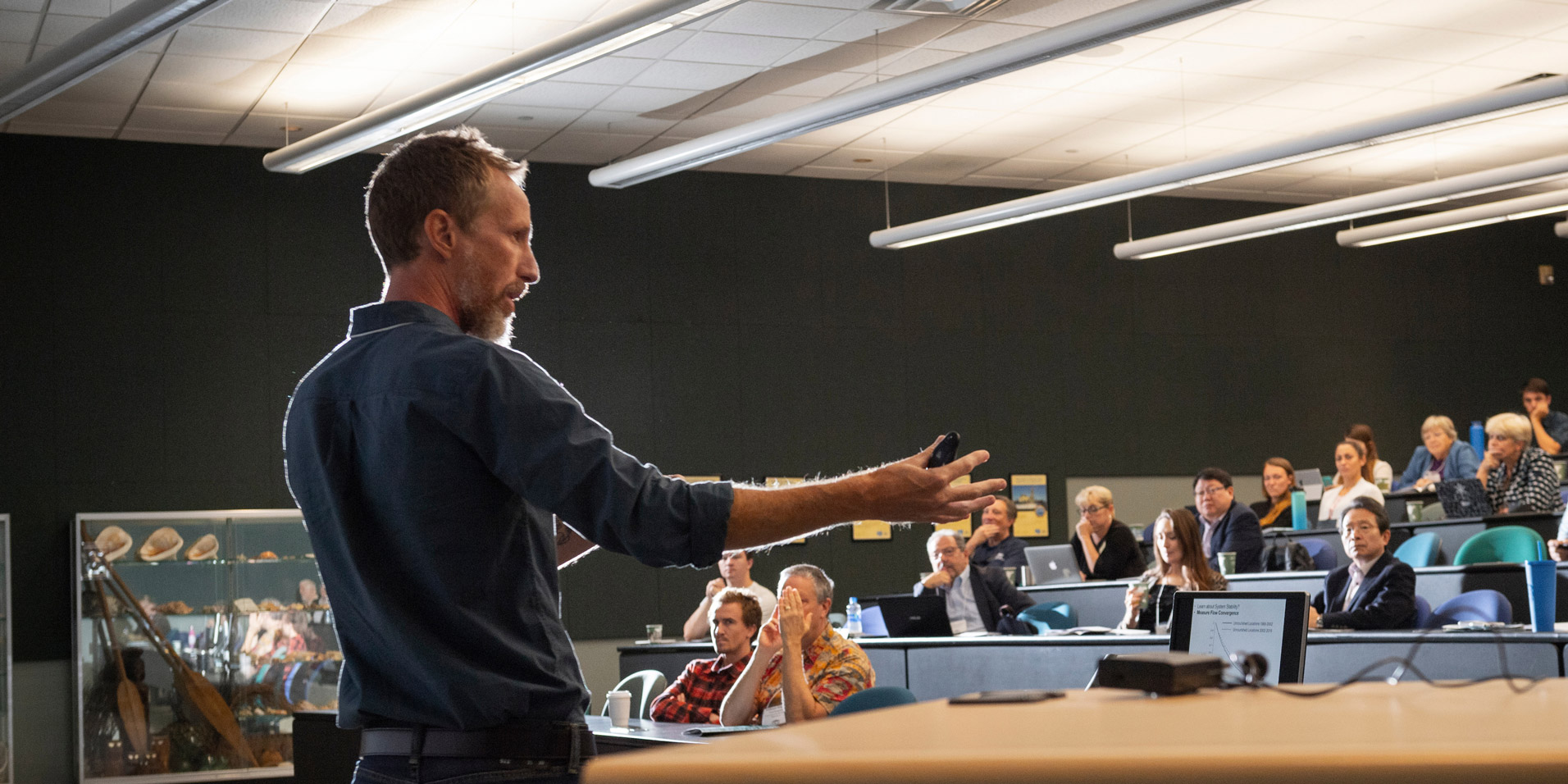 Professor gives lecture during a Physics conference