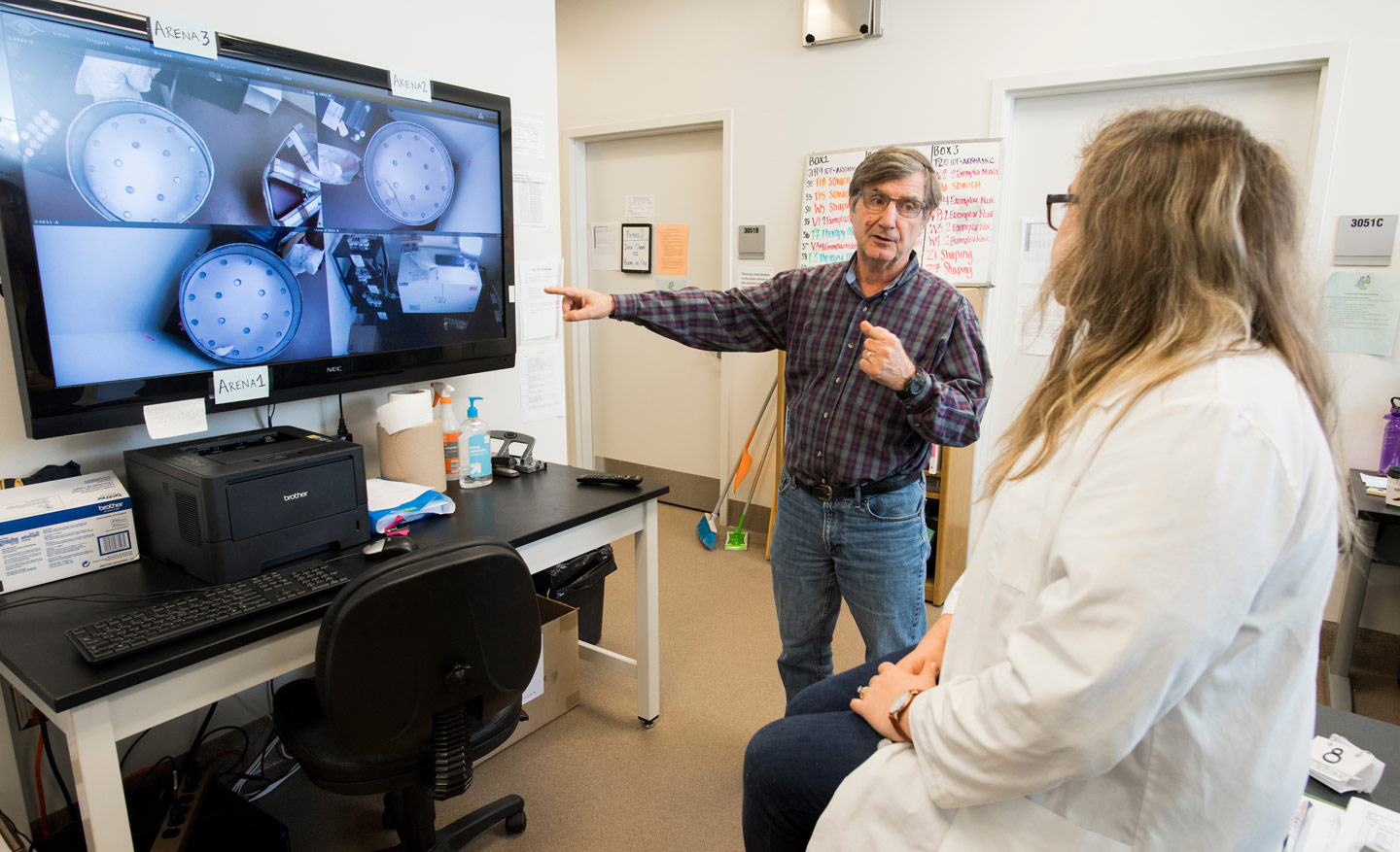 Dr. Mark Galizio talks with a student