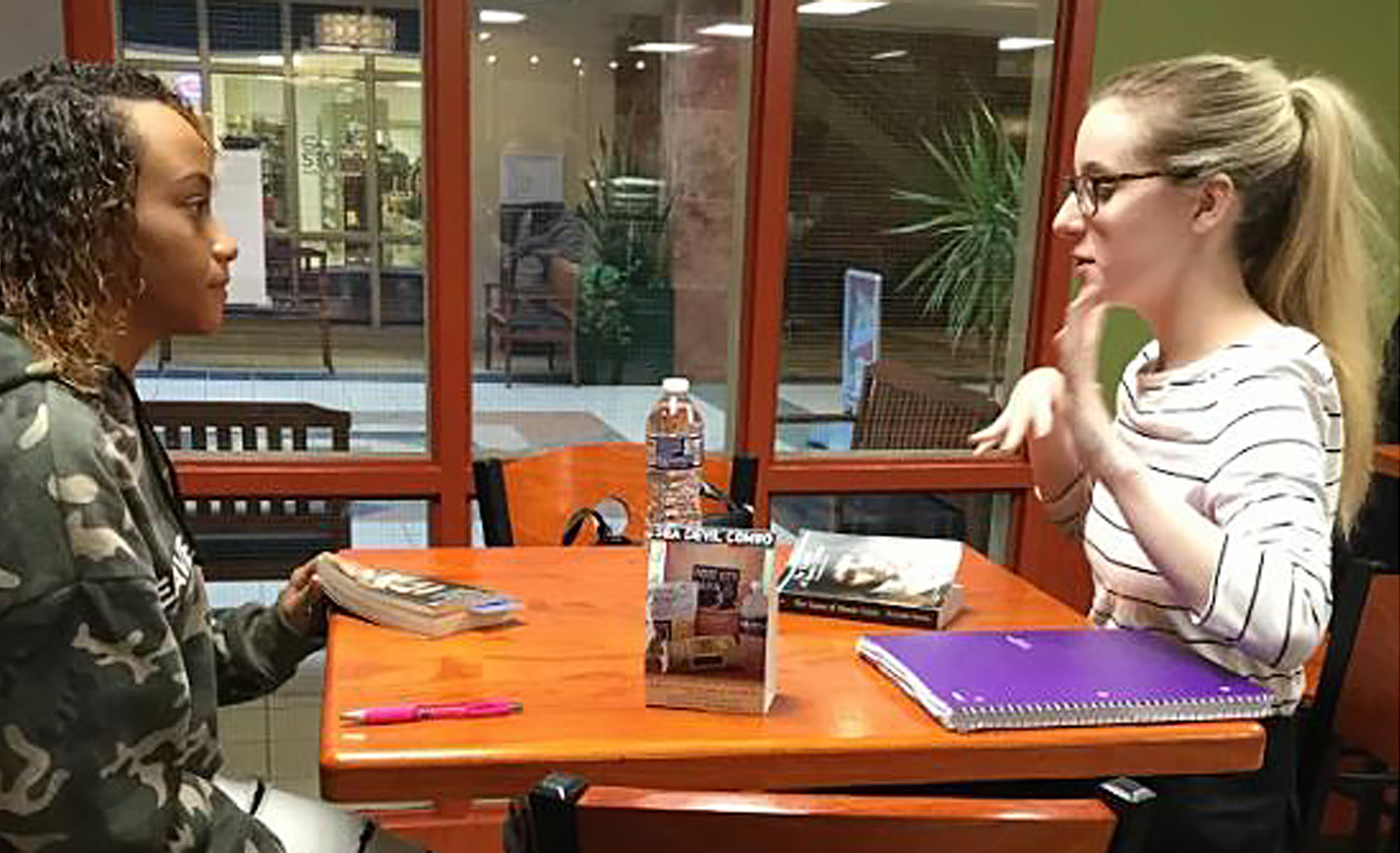 Education student tutors a SEA-Tech high school student