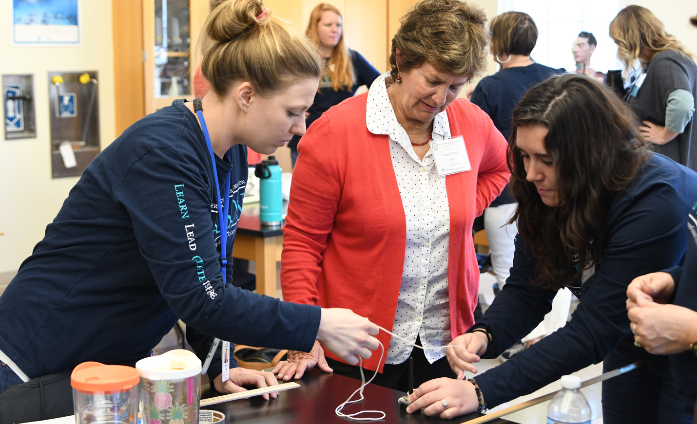 Watson lecturer with two partnership teachers
