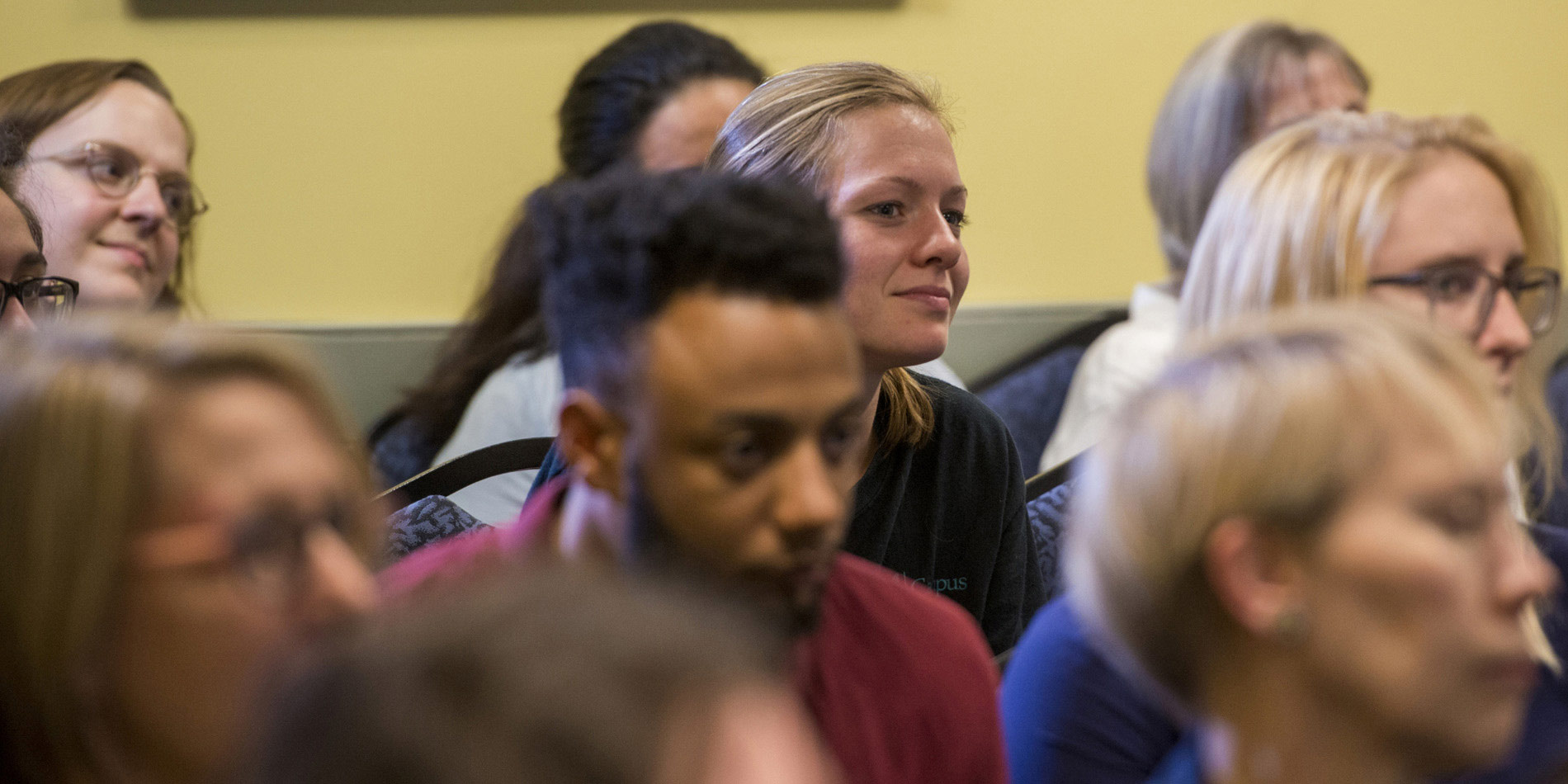 Students listening while attending class.
