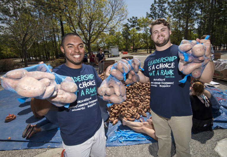 Students at the Yam Jam for local food pantries.