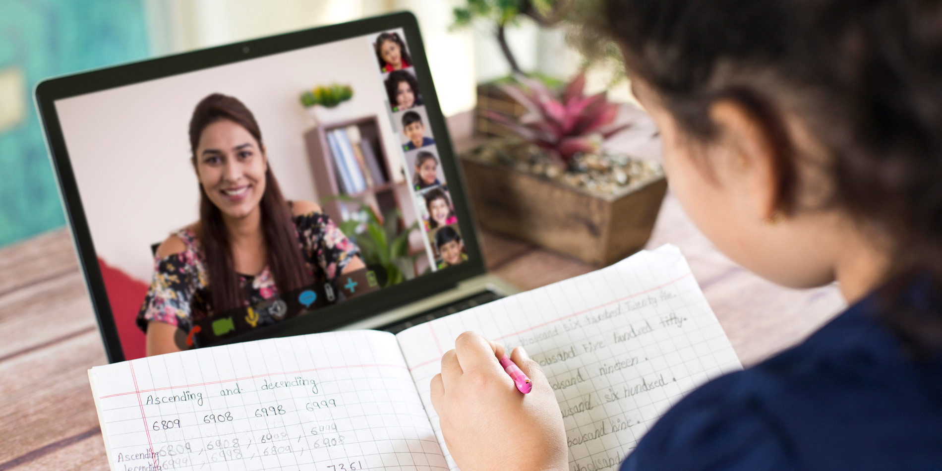 Elementary student in front of a laptop taking an online class