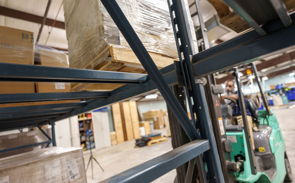 hand truck tilted back carrying boxes