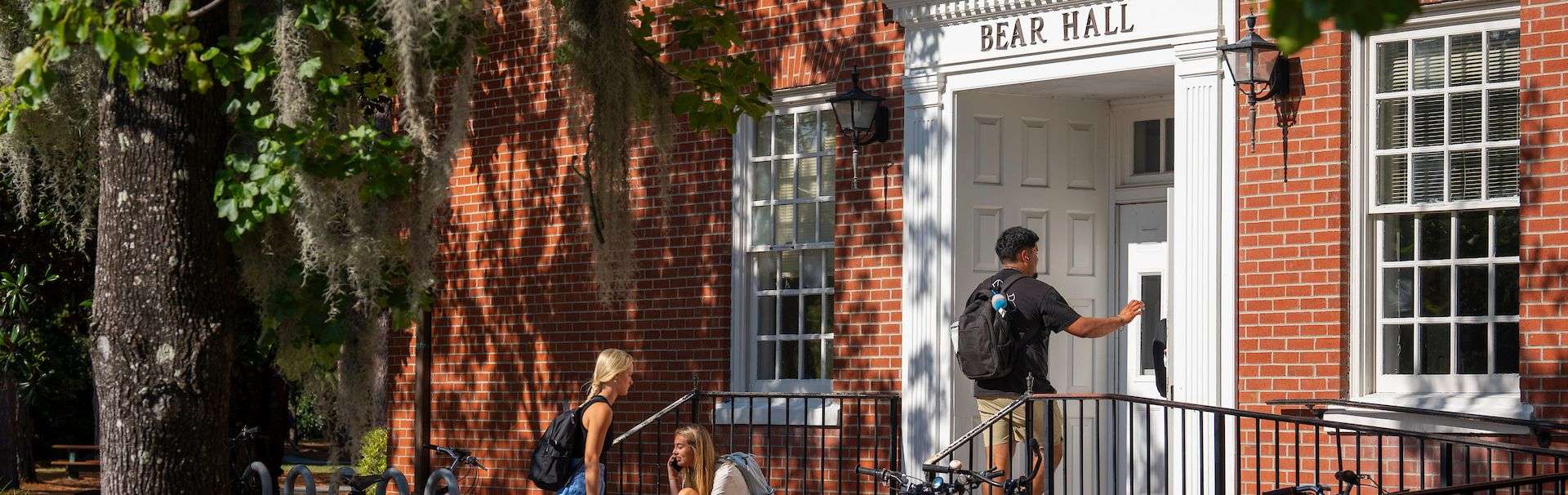 Students at the entrance to Bear Hall