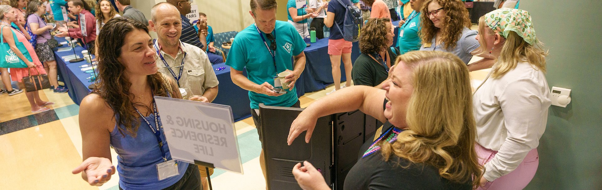 Freshman Orientation participants talking with one another