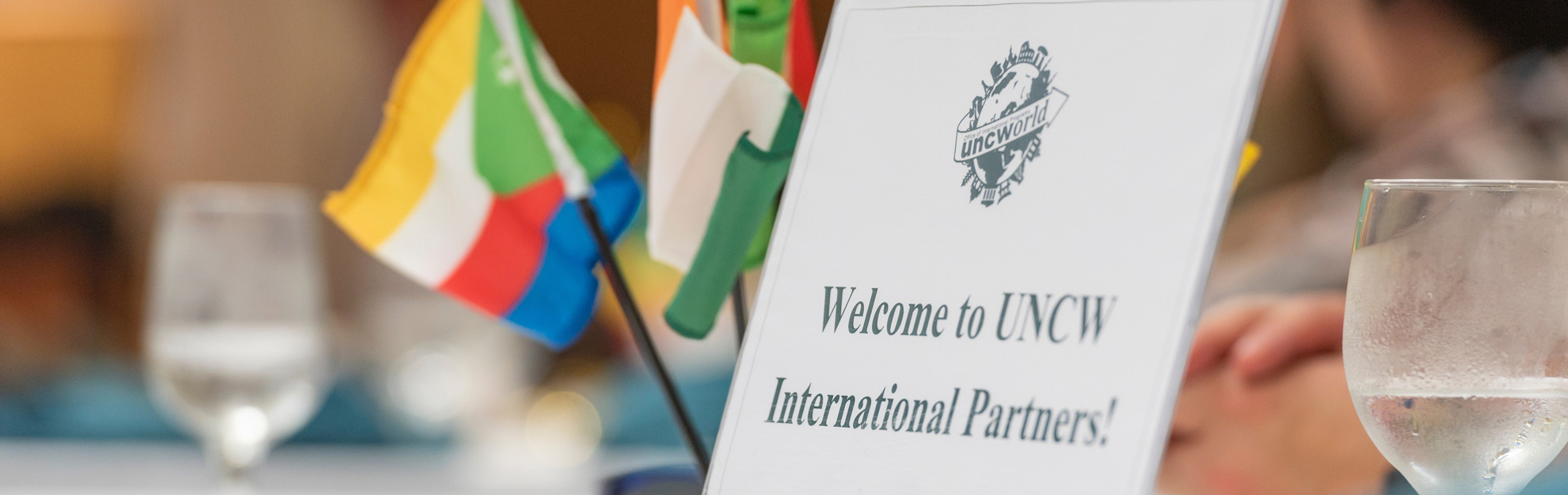 a plaque welcoming international partners