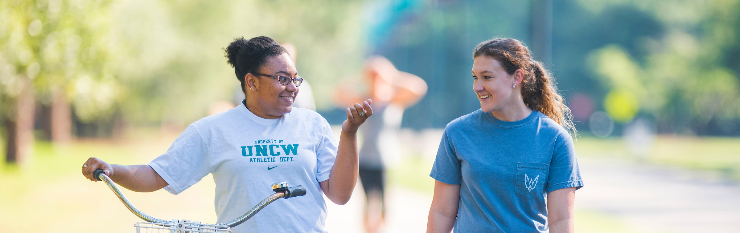 students walking on campus 