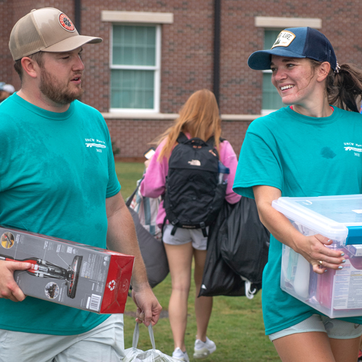 two students moving in