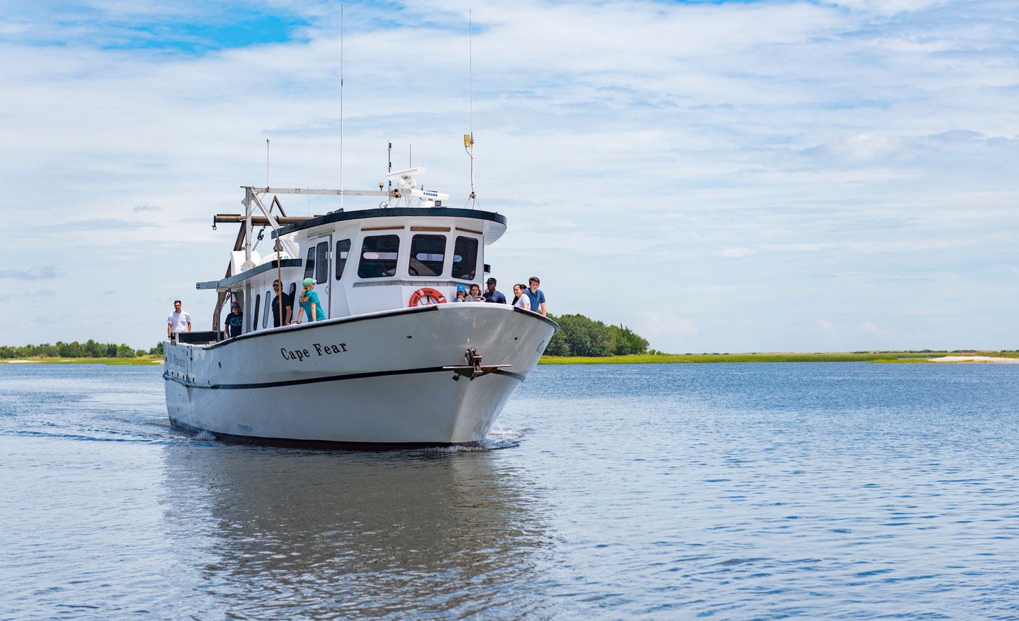 UNCW Boat driving down intercoastal waterway