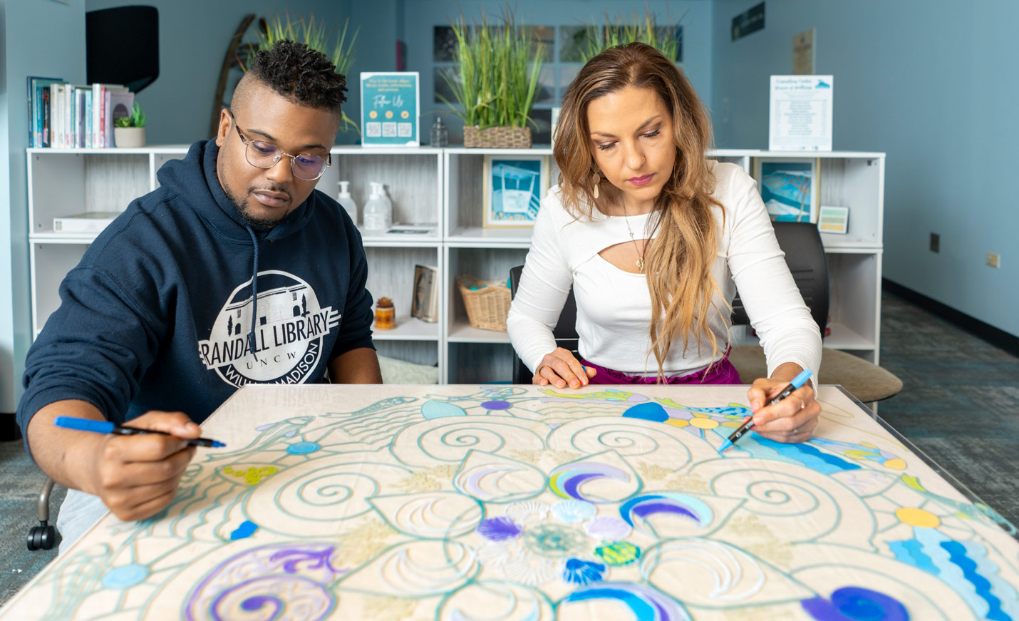 Participants drawing with markers