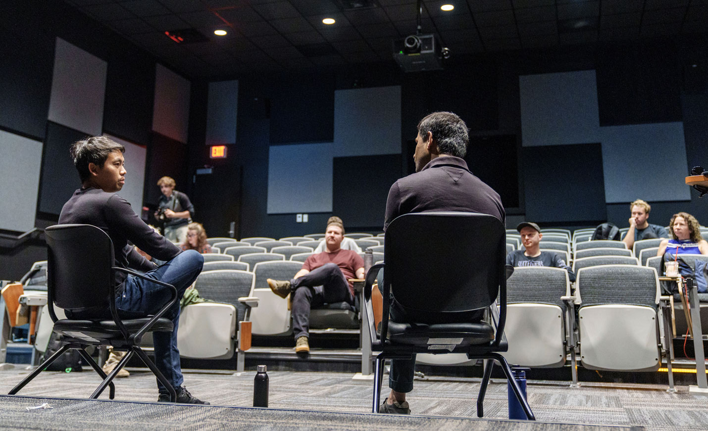 Seated speakers in UFC theater