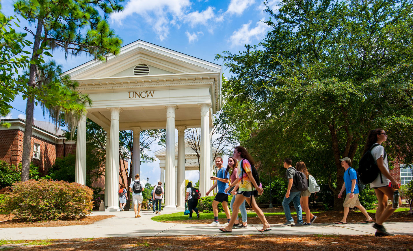 students walking to the northeast entrance of campus
