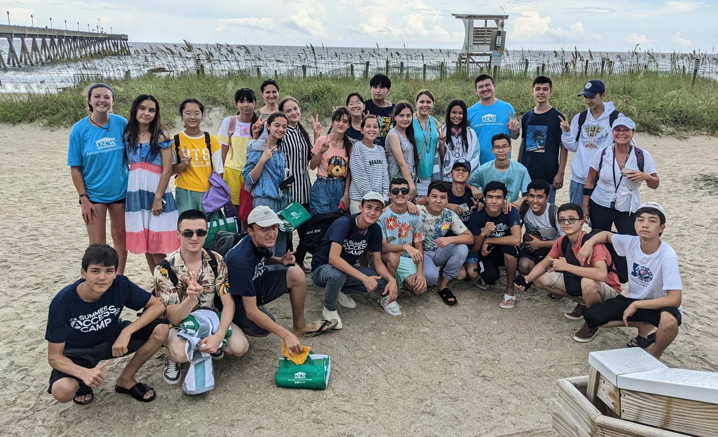 summer access camp group posing on beach