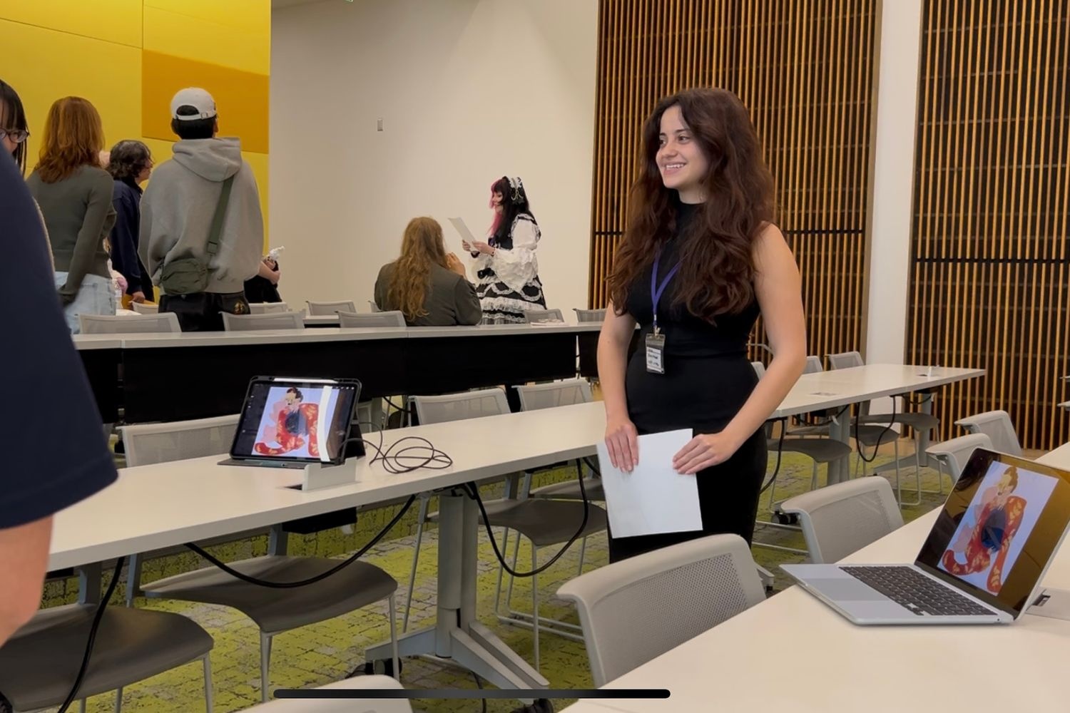 student presents with art