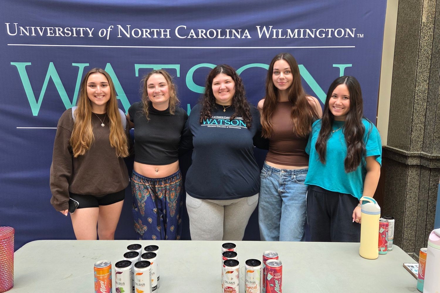 Watson Student Leaders hand out energy drinks