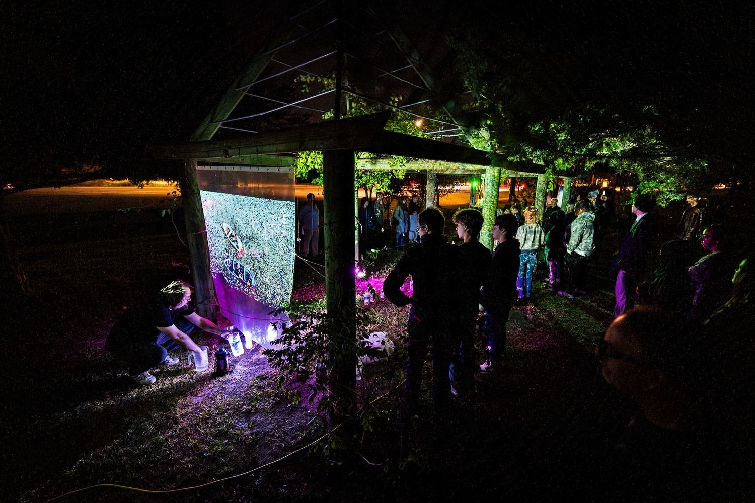 Visitors engaging with FLOWILM exhibit