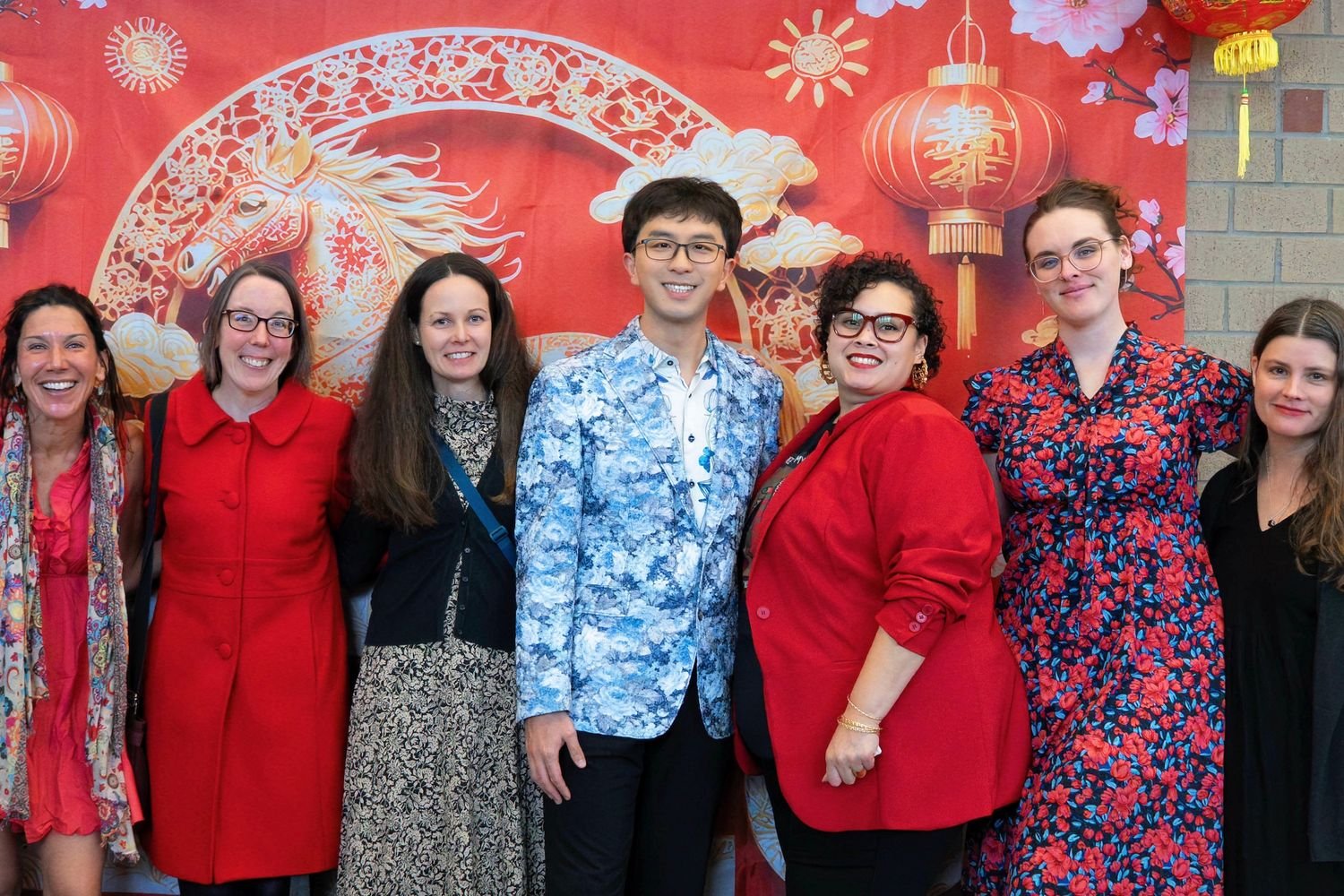 UNCW faculty pose at the Wilmington Chinese New Year Gala