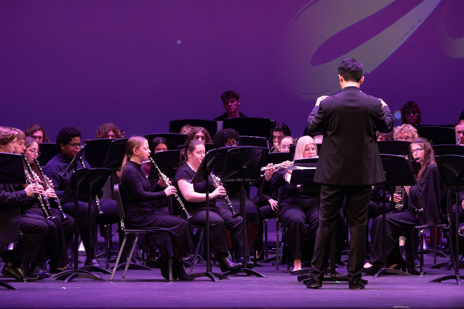 Dachuan Cao conducts the UNCW Symphonic Band at the Wilmington Chinese New Year Gala