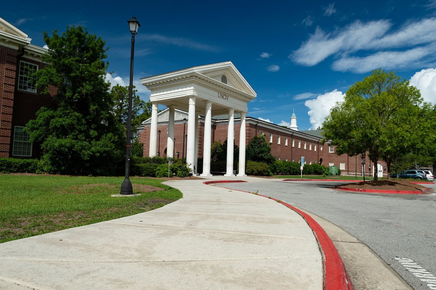 UNCW Pillars at the west entrance of campus