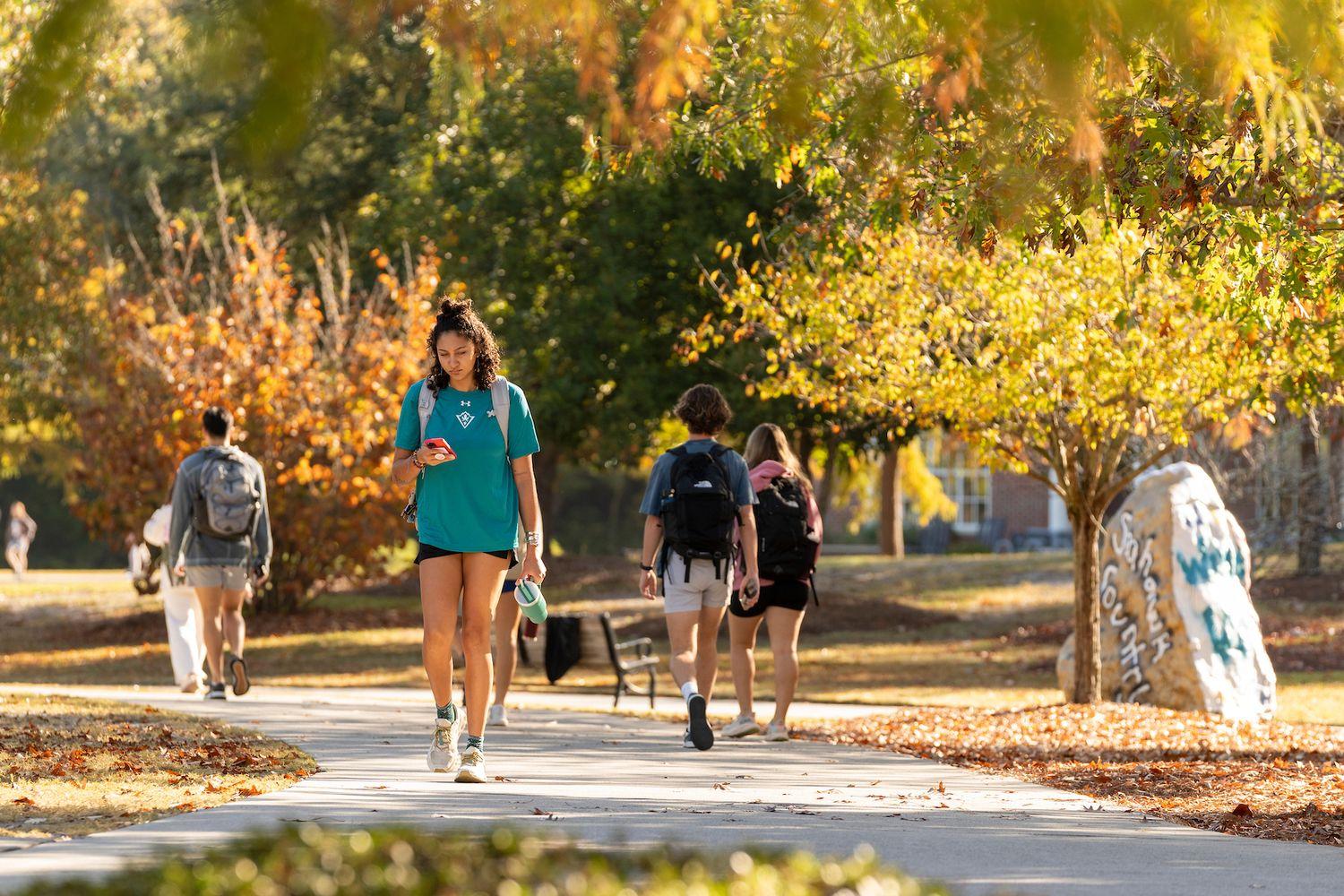 Joyful students enjoying our campus beauty