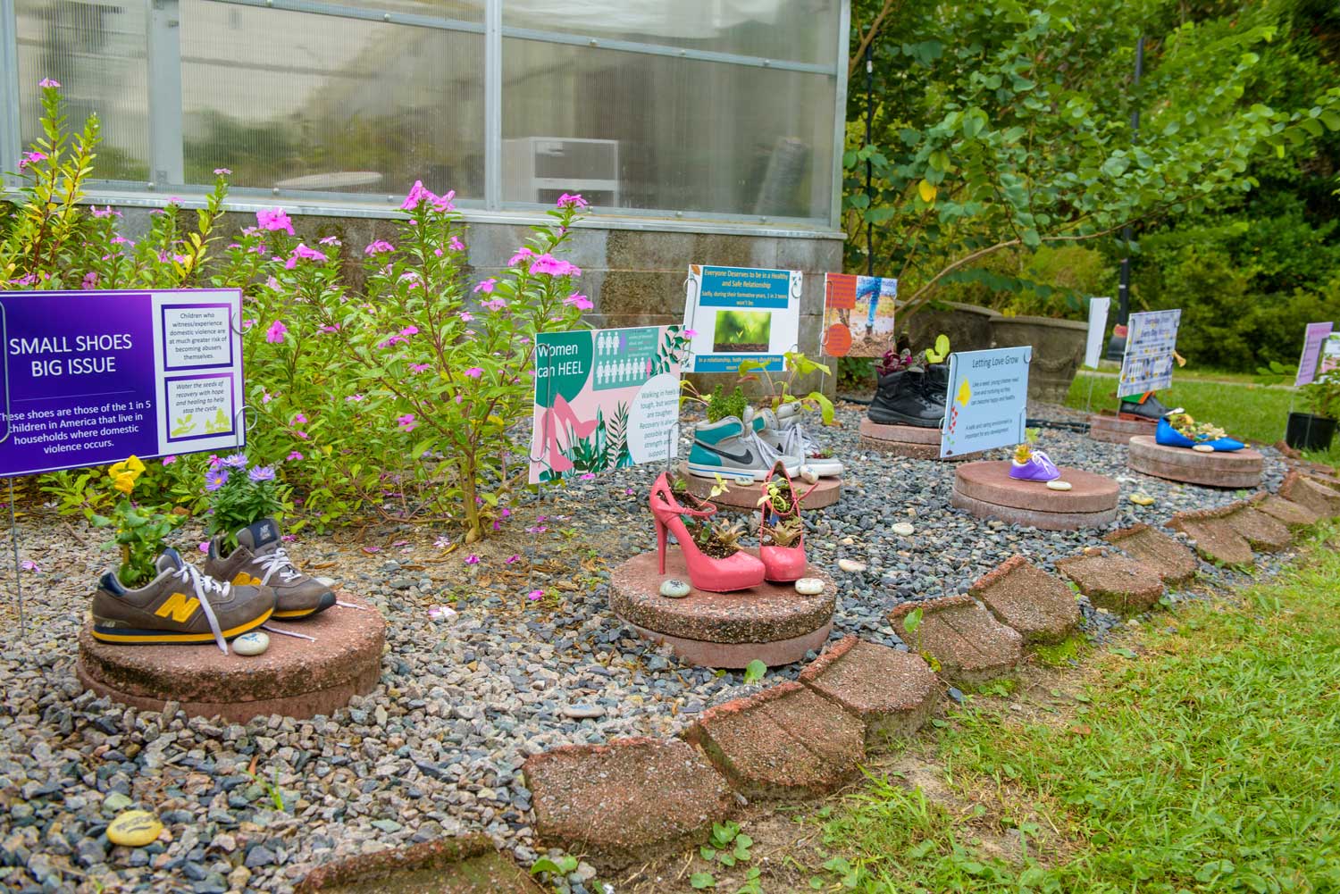 Plants inside shoes garden exhibit