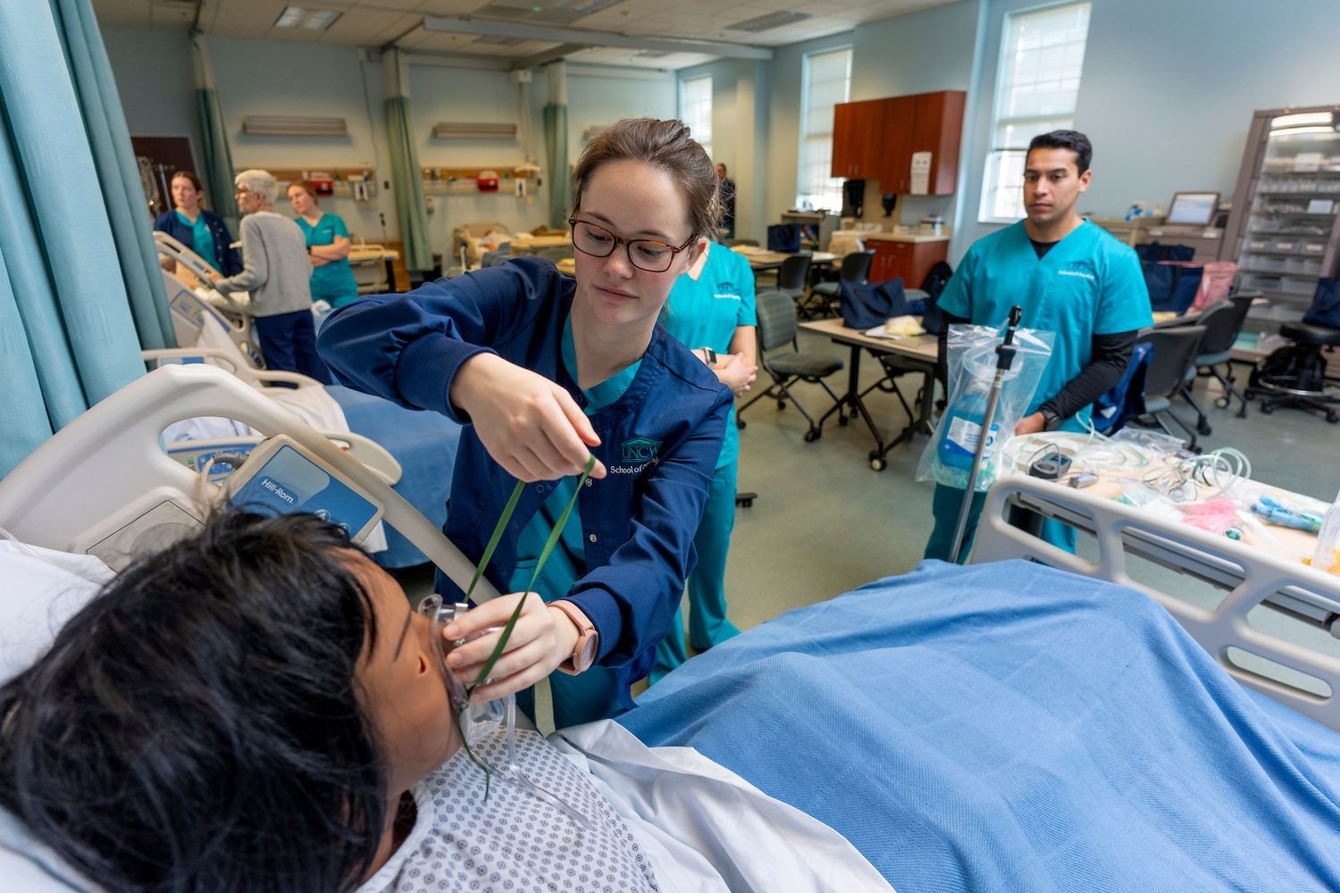 Nursing students practicing at the VITALS lab