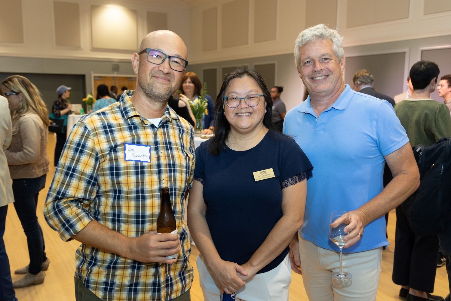 faculty mingling at the Tenure and Promotion Celebration