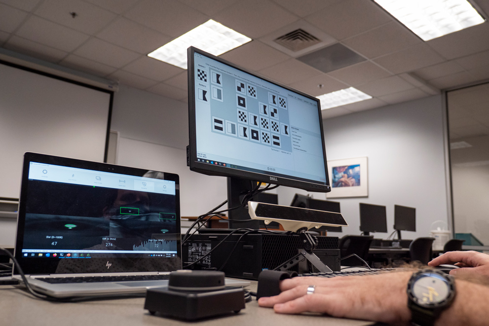 Biometric sensor attached to computer reads information through finger