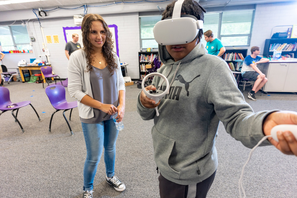 Youth trying out a Virtual Reality Headset