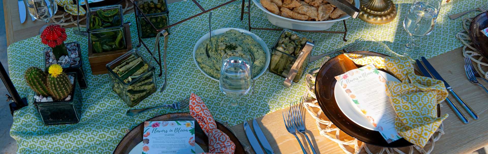dining table outside at the rustic roots dining event in the amphitheater