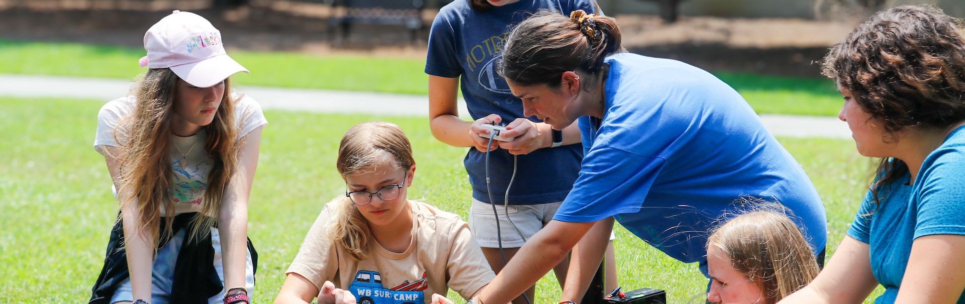 Campers working on ocean engineering device
