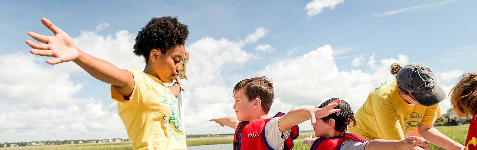 Instructors with students in life jackets