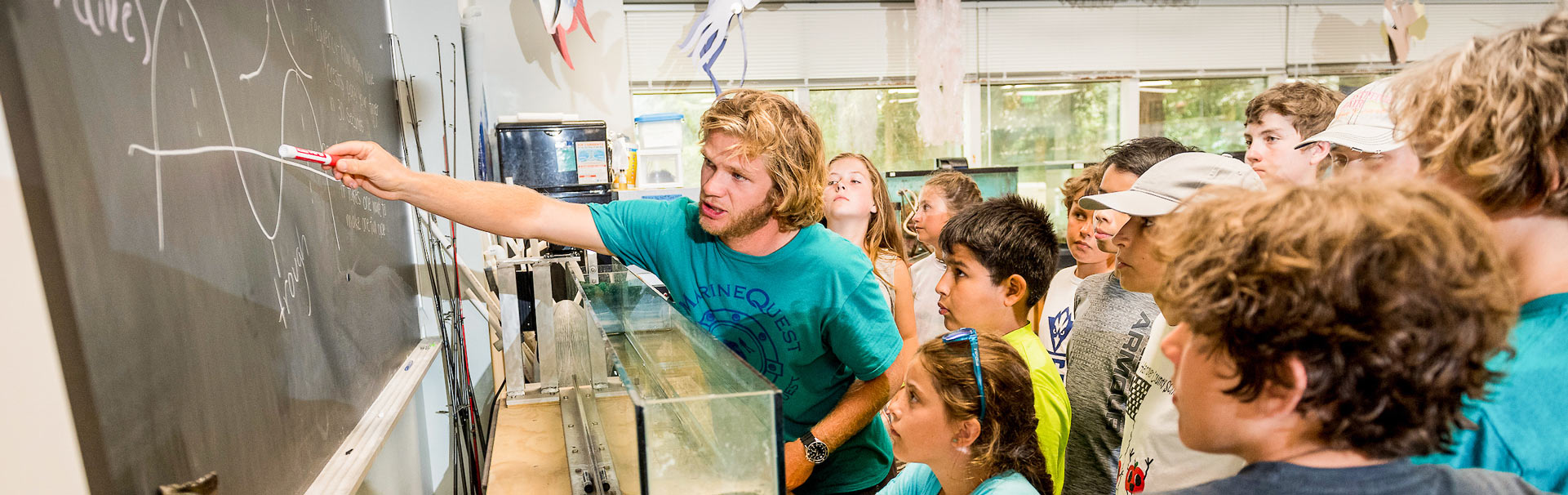 MarineQuest instructor teaching about wave properties.